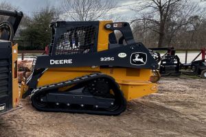 rent our Deere 325g compact skid steer for landscaping and grading dirt work